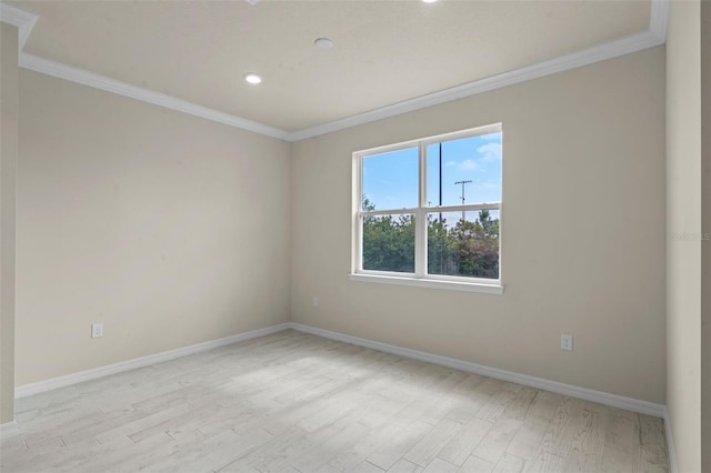 10245 Park Estates Ave, Orlando, FL 32836 - spare room featuring light wood finished floors, ornamental molding, baseboards, and recessed lighting
