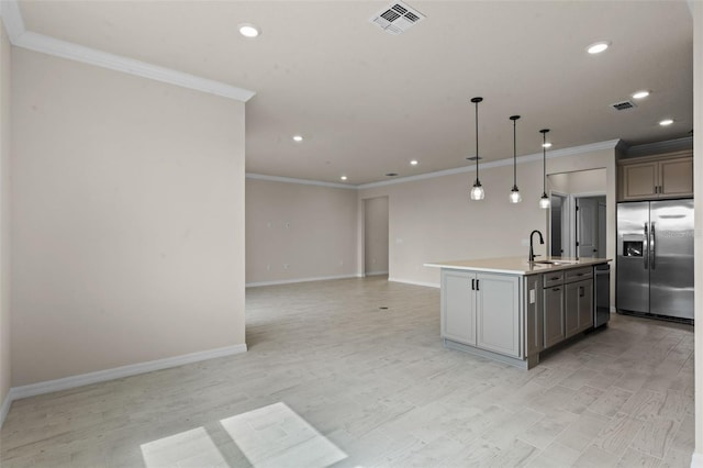 10245 Park Estates Ave, Orlando, FL 32836 - kitchen with stainless steel appliances, a sink, recessed lighting, light wood-style floors, and baseboards