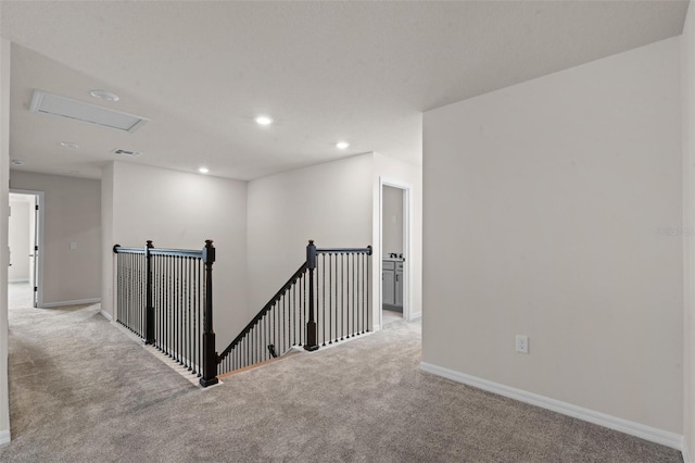 10245 Park Estates Ave, Orlando, FL 32836 - hallway featuring an upstairs landing, carpet, attic access, baseboards, and recessed lighting