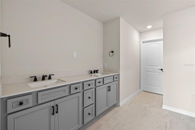 10245 Park Estates Ave, Orlando, FL 32836 - full bath with a sink, baseboards, and recessed lighting