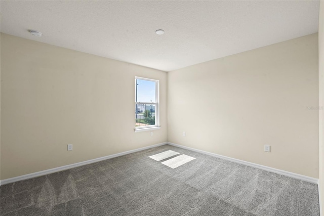 10245 Park Estates Ave, Orlando, FL 32836 - unfurnished room with carpet flooring, baseboards, and a smoke detector