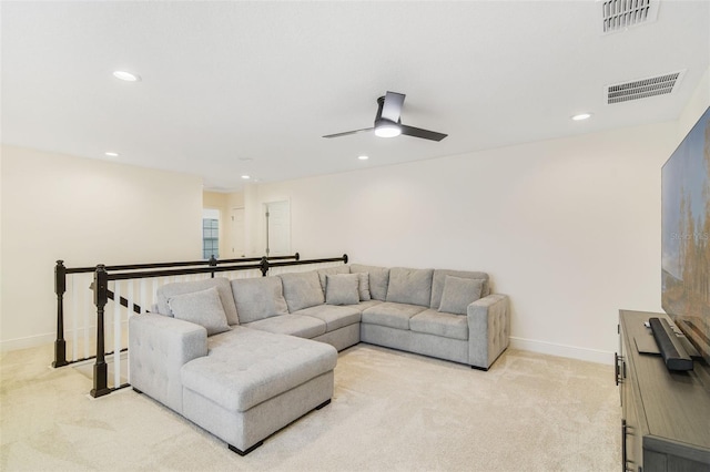 14655 Erice Ave, Clermont, FL 34714 - living area with light colored carpet, baseboards, recessed lighting, and ceiling fan