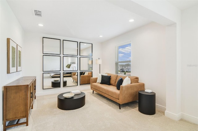 14655 Erice Ave, Clermont, FL 34714 - living room with light carpet, baseboards, and recessed lighting