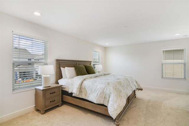 14655 Erice Ave, Clermont, FL 34714 - bedroom with light carpet, baseboards, and recessed lighting