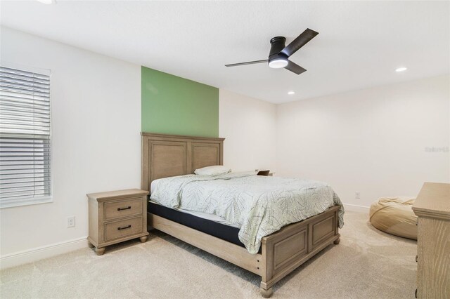 14655 Erice Ave, Clermont, FL 34714 - bedroom featuring light colored carpet, baseboards, recessed lighting, a ceiling fan, and multiple windows