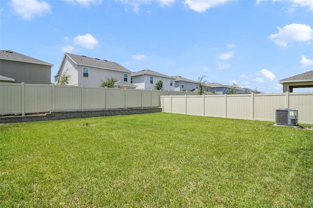 14655 Erice Ave, Clermont, FL 34714 - view of yard with central air condition unit and a residential view