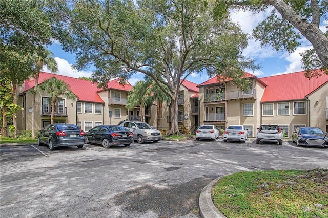 238 Afton Sq Unit 204, Altamonte Springs, FL 32714 - view of property featuring uncovered parking and a residential view