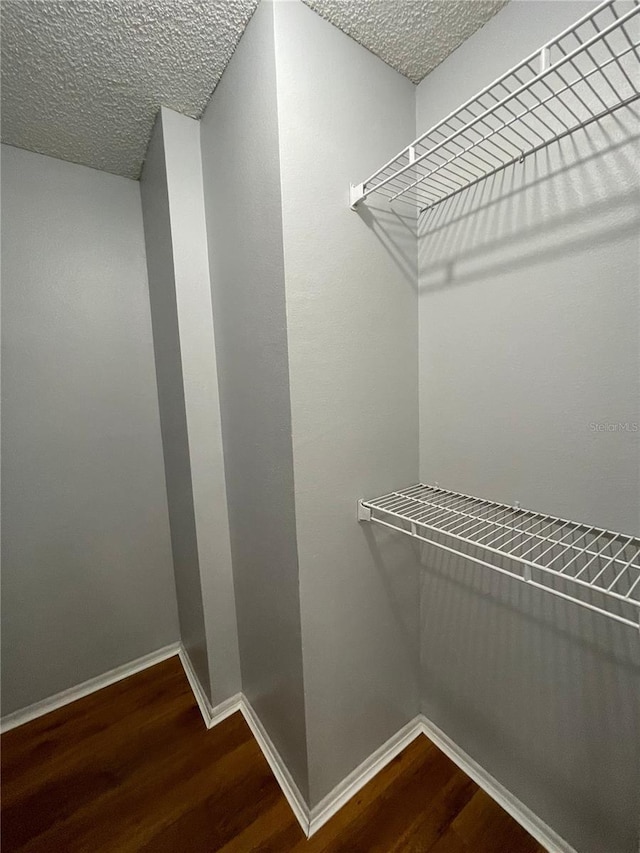 238 Afton Sq Unit 204, Altamonte Springs, FL 32714 - walk in closet featuring wood finished floors