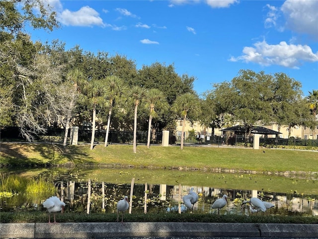 238 Afton Sq Unit 204, Altamonte Springs, FL 32714 - view of property's community with a water view and a lawn