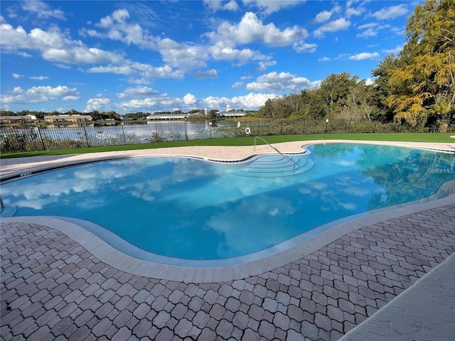 238 Afton Sq Unit 204, Altamonte Springs, FL 32714 - view of pool with a water view and a fenced backyard