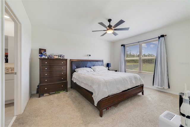 2135 E Old Mill Dr, Deltona, FL 32725 - bedroom with light colored carpet, baseboards, and a ceiling fan
