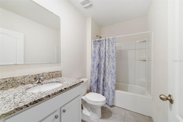 2135 E Old Mill Dr, Deltona, FL 32725 - full bath featuring vanity, toilet, shower / bath combination with curtain, and tile patterned flooring