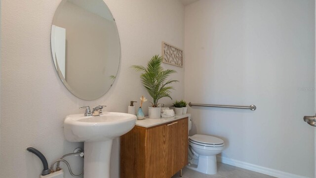 1325 June Lake Loop, Haines City, FL 33844 - bathroom with toilet and tile patterned floors
