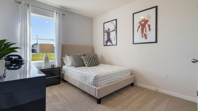 1325 June Lake Loop, Haines City, FL 33844 - bedroom featuring carpet flooring and baseboards