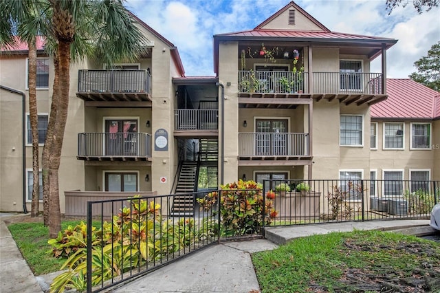 238 Afton Sq Unit 106, Altamonte Springs, FL 32714 - view of building exterior with fence