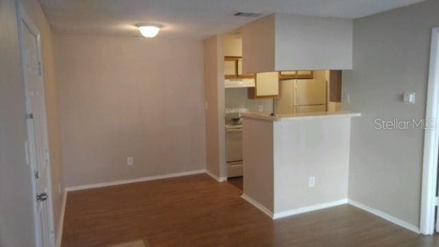 238 Afton Sq Unit 106, Altamonte Springs, FL 32714 - unfurnished room featuring wood finished floors and baseboards