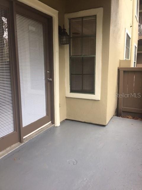 238 Afton Sq Unit 106, Altamonte Springs, FL 32714 - property entrance with stucco siding