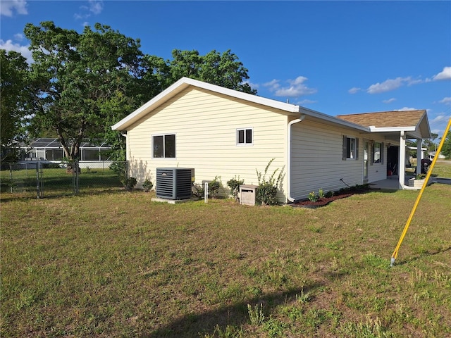 11282 SW 62nd Avenue Rd, Ocala, FL 34476 - back of property featuring central AC unit