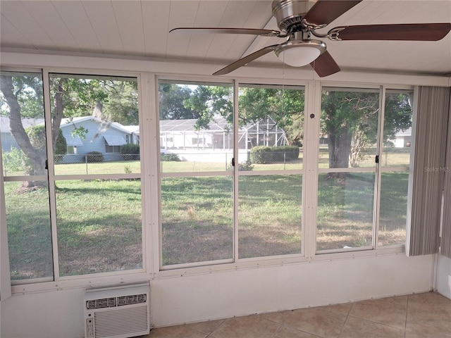 11282 SW 62nd Avenue Rd, Ocala, FL 34476 - unfurnished sunroom with healthy amount of natural light, ceiling fan, and a wall unit AC