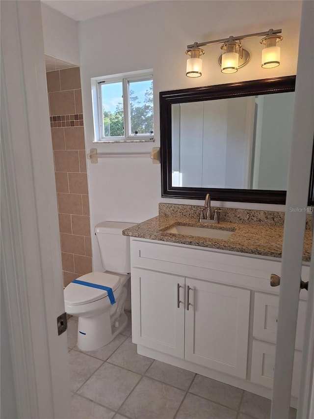 11282 SW 62nd Avenue Rd, Ocala, FL 34476 - bathroom with toilet, vanity, tile patterned flooring, and tiled shower