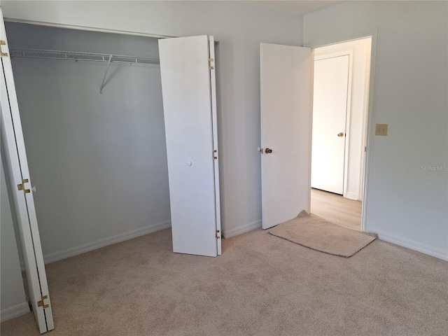 11282 SW 62nd Avenue Rd, Ocala, FL 34476 - unfurnished bedroom with carpet, baseboards, and a closet
