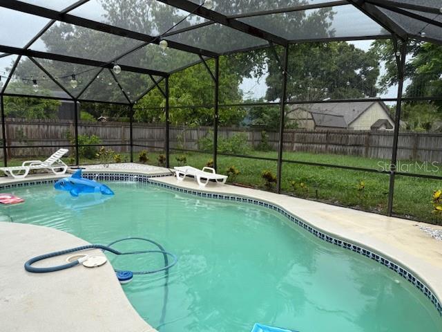 2514 Dovetail Dr, Ocoee, FL 34761 - view of pool featuring a fenced backyard and a lanai