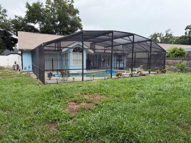 2514 Dovetail Dr, Ocoee, FL 34761 - rear view of house with glass enclosure