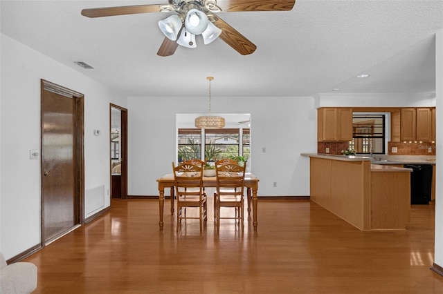 1830 W Clinton Dr, Saint Cloud, FL 34769 - dining space featuring wood finished floors, ceiling fan, baseboards, and recessed lighting