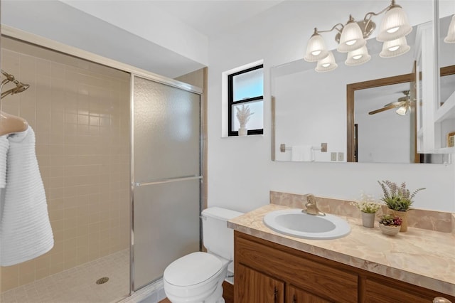 1830 W Clinton Dr, Saint Cloud, FL 34769 - full bath featuring a shower stall, vanity, toilet, and ceiling fan