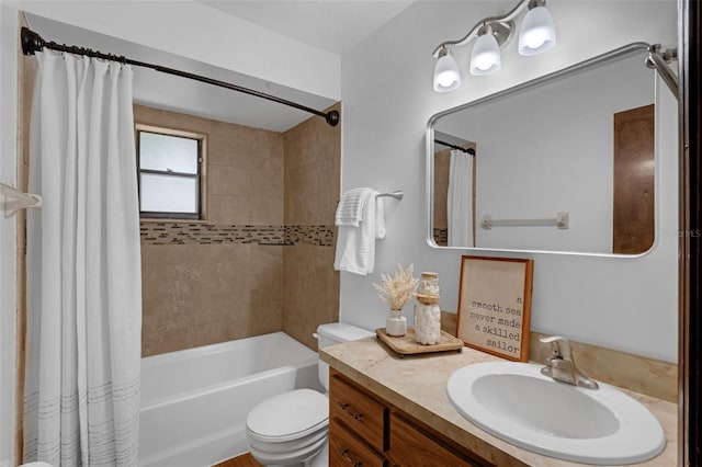 1830 W Clinton Dr, Saint Cloud, FL 34769 - bathroom featuring shower / bath combo with shower curtain, vanity, and toilet