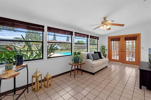 1830 W Clinton Dr, Saint Cloud, FL 34769 - sunroom / solarium featuring french doors, tile patterned flooring, and vaulted ceiling