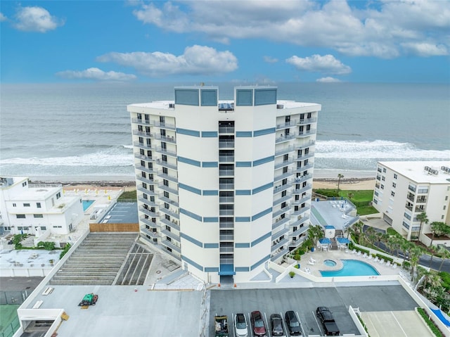 5207 S Atlantic Ave Unit 225, New Smyrna Beach, FL 32169 - view of apartment building / complex featuring view of water and beach