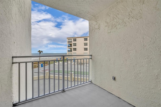 5207 S Atlantic Ave Unit 225, New Smyrna Beach, FL 32169 - balcony with view of water and beach