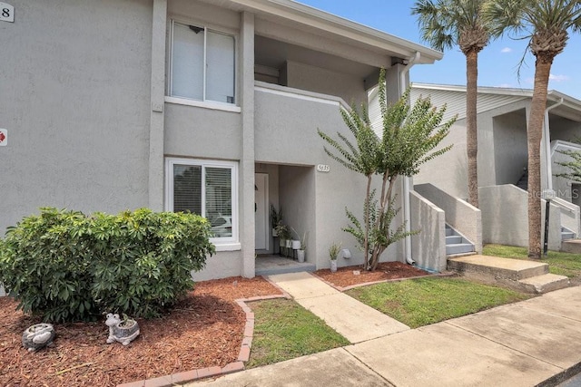 5635 Blue Shadows Ct Unit 3, Orlando, FL 32811 - entrance to property with stucco siding