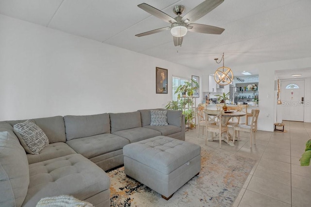 5635 Blue Shadows Ct Unit 3, Orlando, FL 32811 - living room featuring ceiling fan, light tile patterned floors, and a chandelier