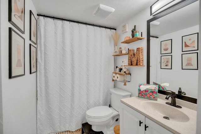 5635 Blue Shadows Ct Unit 3, Orlando, FL 32811 - bathroom featuring toilet and vanity