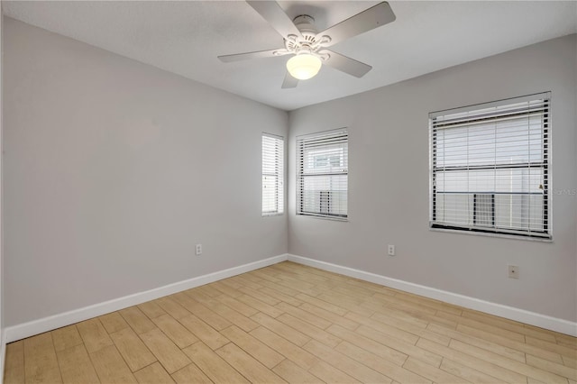 6 Cimmaron Dr, Palm Coast, FL 32137 - unfurnished room featuring baseboards, light wood-type flooring, and a ceiling fan