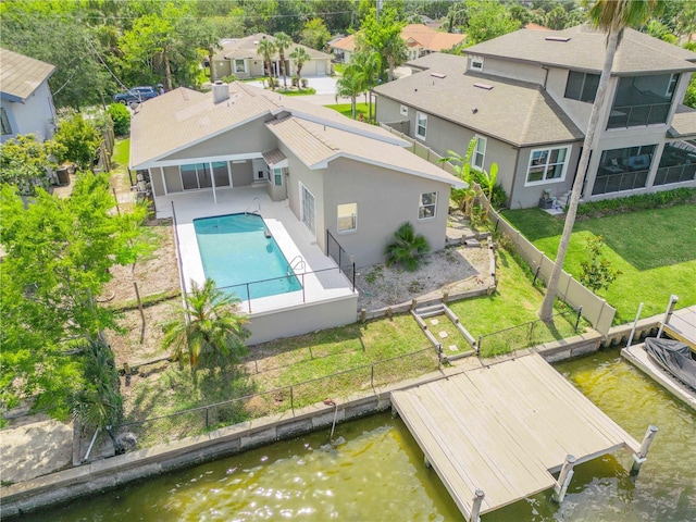 6 Cimmaron Dr, Palm Coast, FL 32137 - back of house with a patio, a fenced backyard, a water view, stucco siding, and a residential view
