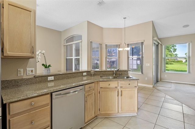 2710 Autumn Ln, Eustis, FL 32726 - kitchen featuring dishwasher, a sink, light brown cabinetry, and light tile patterned floors