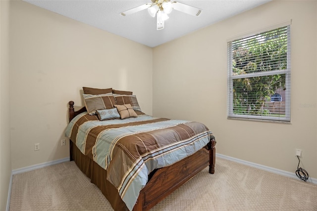 2710 Autumn Ln, Eustis, FL 32726 - bedroom with carpet flooring, baseboards, and ceiling fan