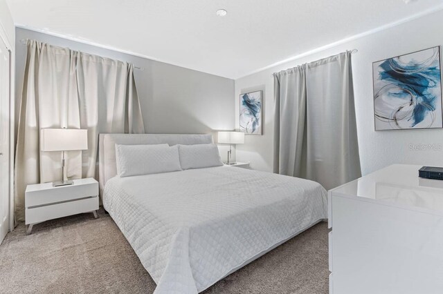 8833 Cruden Bay Ct, Davenport, FL 33896 - bedroom featuring carpet flooring