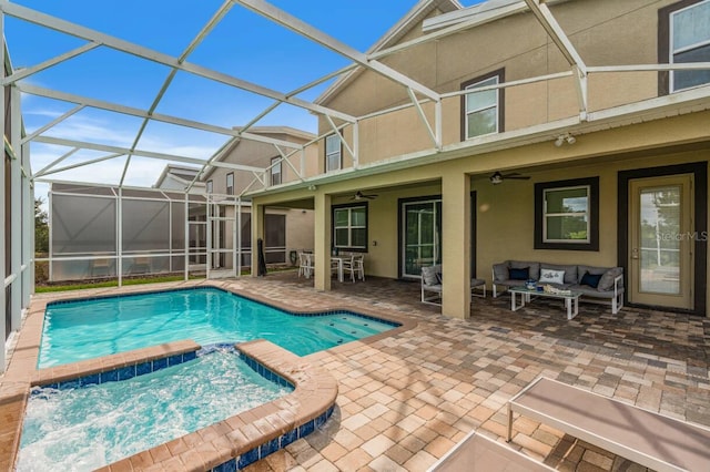 8833 Cruden Bay Ct, Davenport, FL 33896 - view of pool featuring an outdoor living space, a patio area, ceiling fan, and a pool with connected hot tub