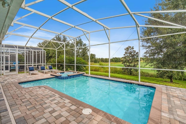 8833 Cruden Bay Ct, Davenport, FL 33896 - view of swimming pool featuring a patio, a pool with connected hot tub, and glass enclosure