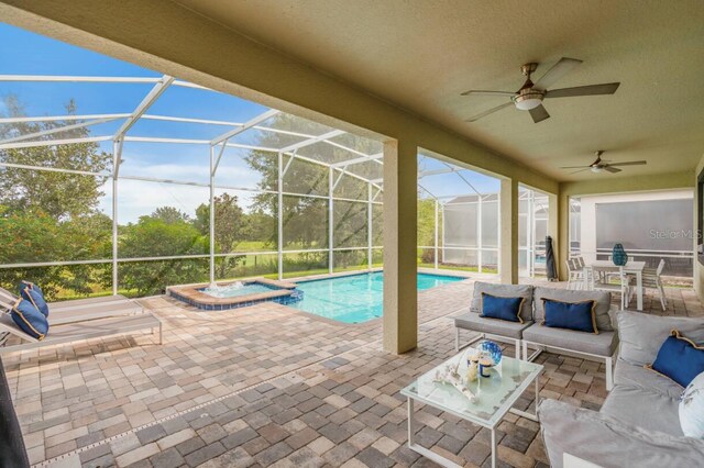8833 Cruden Bay Ct, Davenport, FL 33896 - view of pool with a patio, outdoor lounge area, a pool with connected hot tub, and ceiling fan