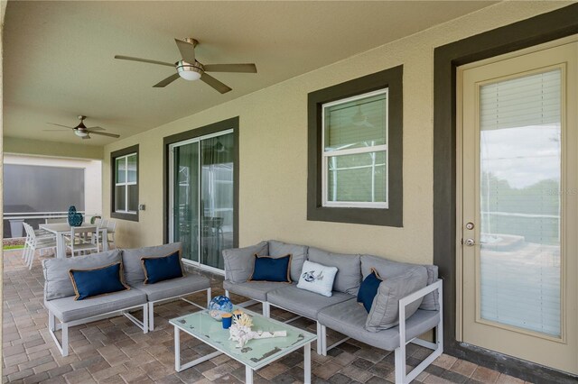 8833 Cruden Bay Ct, Davenport, FL 33896 - view of patio featuring ceiling fan and an outdoor hangout area