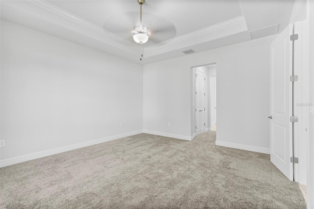 304 N Jungle Rd, Geneva, FL 32732 - carpeted empty room featuring crown molding, a raised ceiling, baseboards, and a ceiling fan
