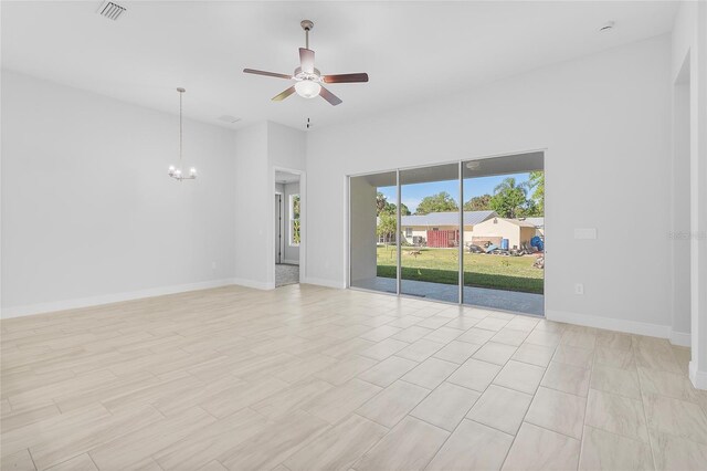 304 N Jungle Rd, Geneva, FL 32732 - unfurnished room featuring ceiling fan, a chandelier, and baseboards