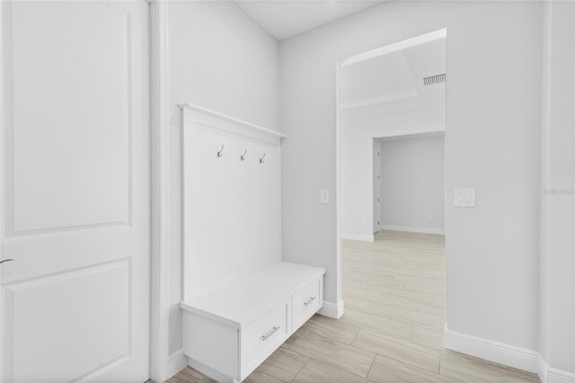 304 N Jungle Rd, Geneva, FL 32732 - mudroom with baseboards and light wood-style floors