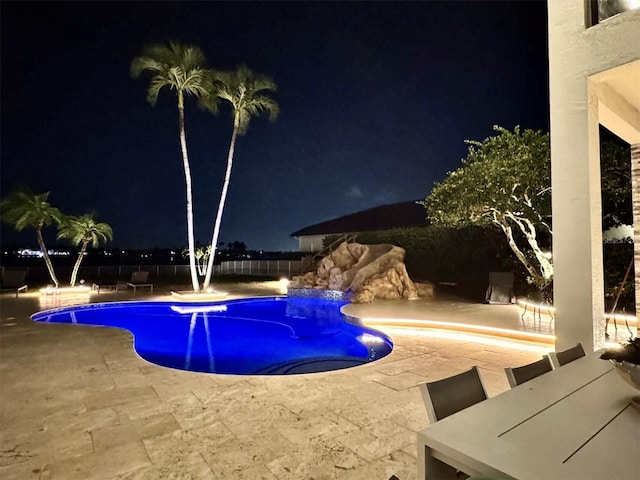 3924 SW 189th Ave, Miramar, FL 33029 - pool at twilight featuring a patio area, an outdoor pool, and fence