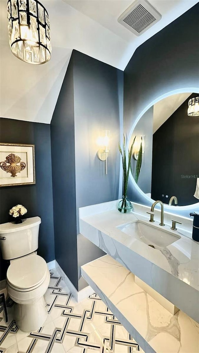 3924 SW 189th Ave, Miramar, FL 33029 - half bath featuring a sink, toilet, and baseboards